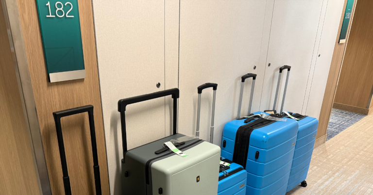 Luggage lined up outside a cruise ship cabin on embarkation day